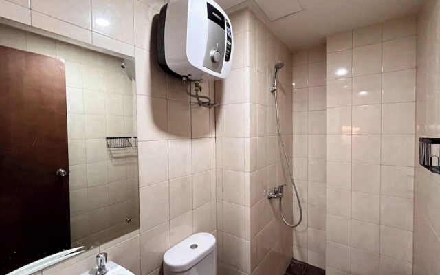 Warm And Homey 2Br At Vida View Makassar Apartment