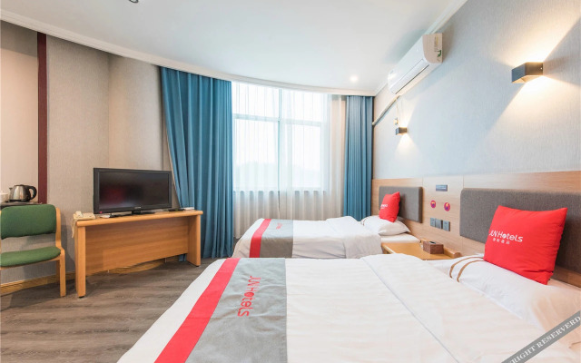 Junyi chain hotel (Gaobeidian Baigou Trade City store)