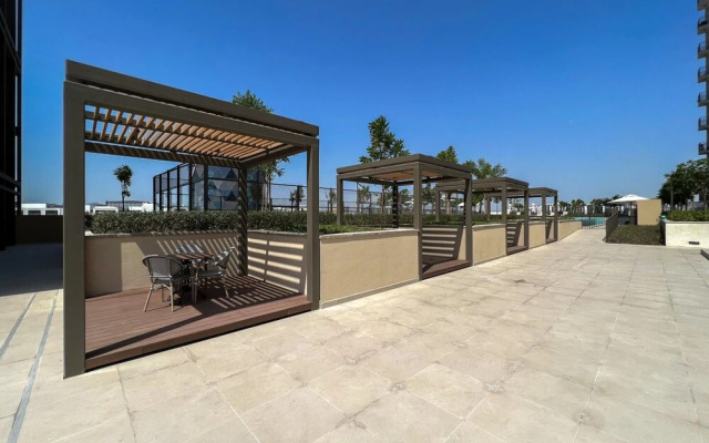 Contemporary 1BR Sleeps4 Balcony Pool Gym Dxbhills