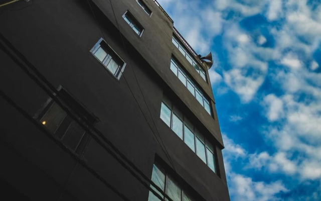 LetsBunk Poshtel & Suites