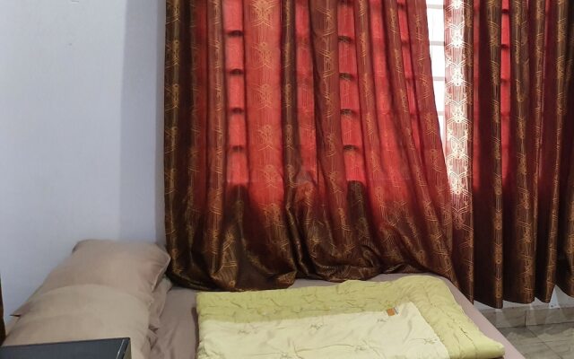 OYO Home 90496 Delima Homestay