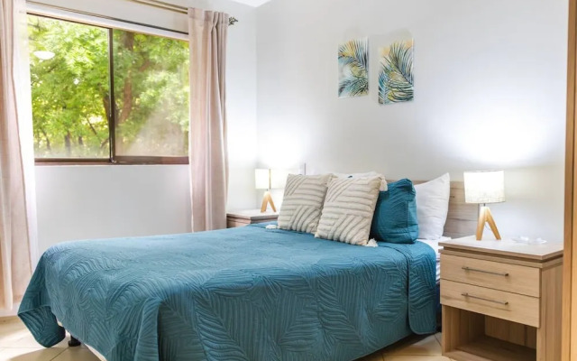 Cozy Condo with Panoramic Hillside Views from Rooftop Terrace and Short Walk to Beach