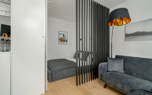 Dark Grey Apartment in Poznan by Renters