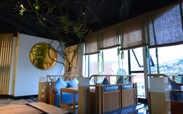 Youjia Traders Hotel (Pengzhou Longxing Temple)