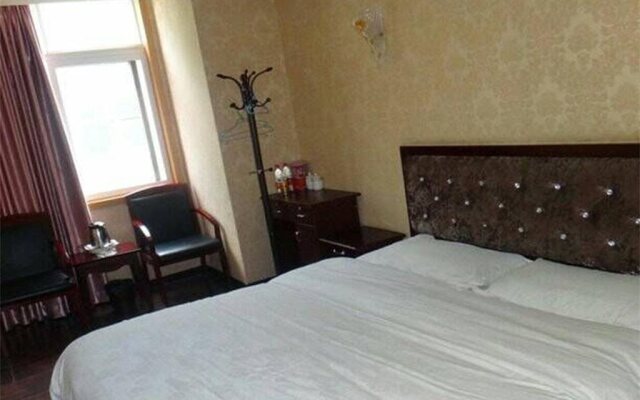 Anxian Mingyi Business Hotel