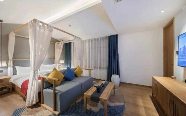 Qianna Hotel (Zhengzhou Erqi Square David City)