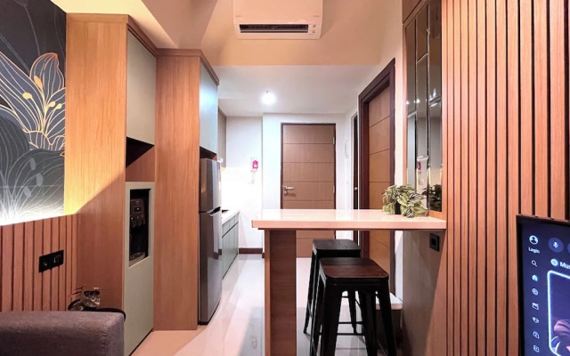 Warm And Homey 2Br At Vida View Makassar Apartment