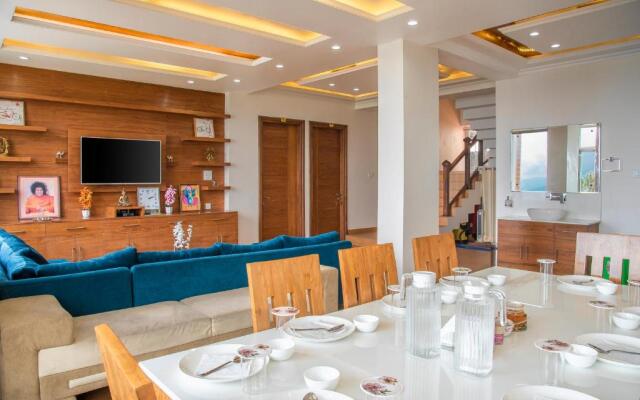 The White Haven Homestay I Rooms & Kitchen