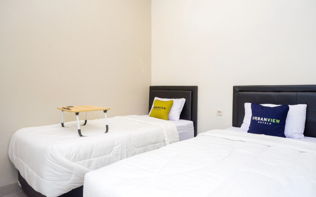 Urbanview Hotel John Sweet Home