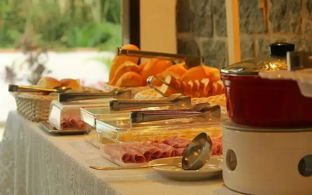 Village Colonial Hotel