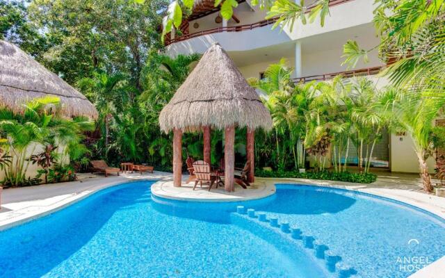Condo Complex with an Alluring Pool & Tropical Vibes by Stella Rentals