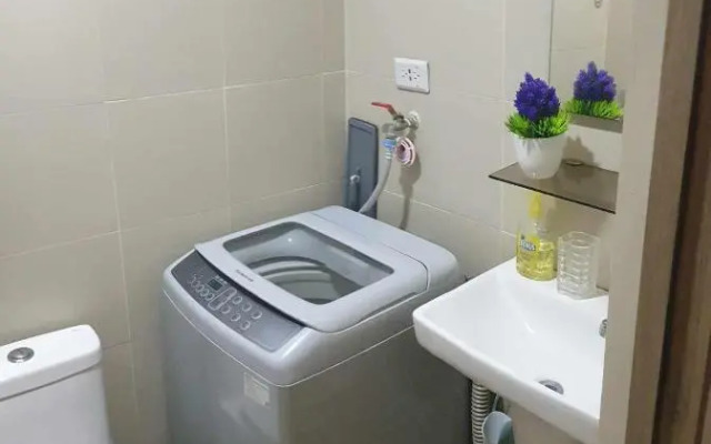 Cozy 1BR with balcony at Fame Residences