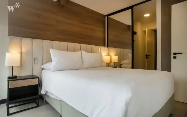 w Modern 1BR in Exclusive San Isidro