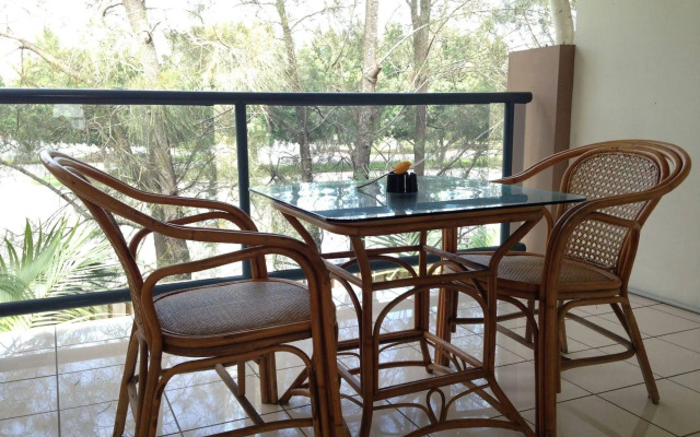 Novena Palms Motel