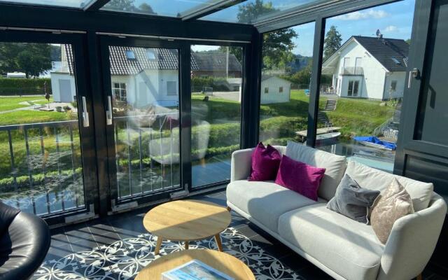 Luxus FeWo 112m² direkt am Wasser inkl. Boot