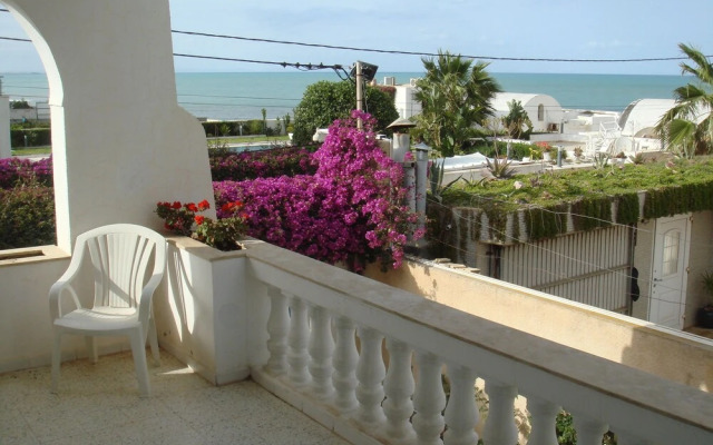 Partie de pittoresque maison en bord de mer