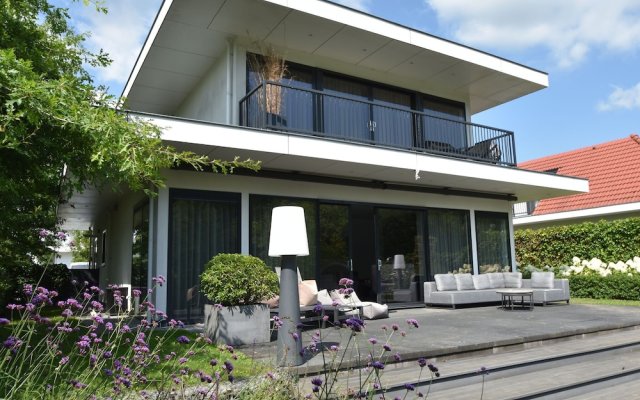 Modern Villa in Harderwijk with Sauna & Hot Tub