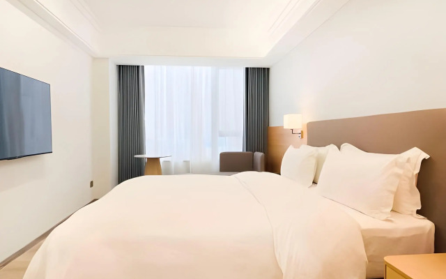 La Perle International Hotel - Free shuttle between hotel and Exhibition Center during Canton Fair & Exhibitor registration Counter