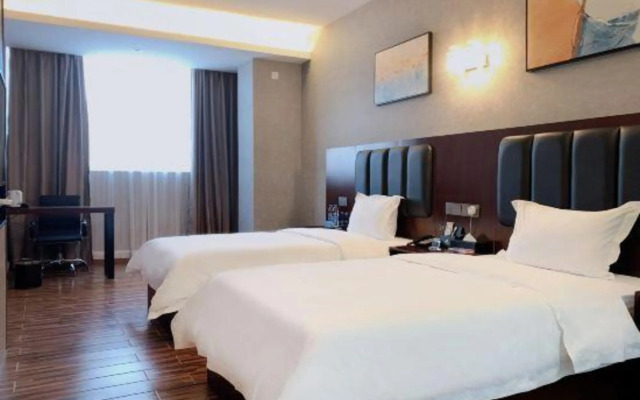 Qishan Hotel (Zhongshan Yijiayi Xinghe Plaza)