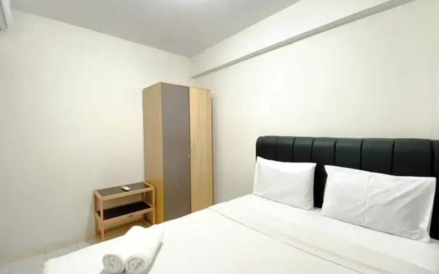Tidy and Warm 2BR at Podomoro Golf View Apartment