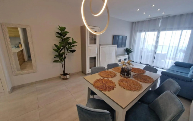 SUNSET WAVES vistas al mar