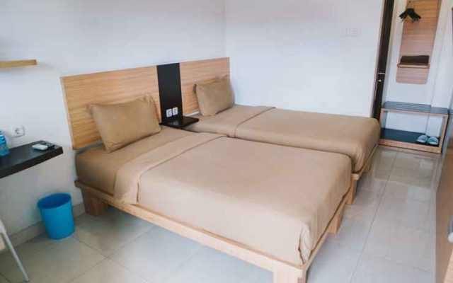 Rajawali Inn – Guest Rooms – Palu