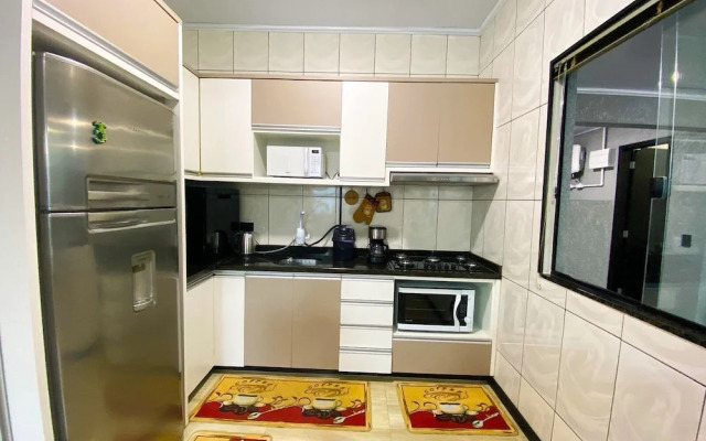 Casa Central piscina e AC para 8 hospede