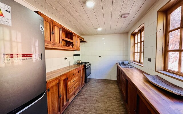 Cabañas entre montañas con tinajas calientes