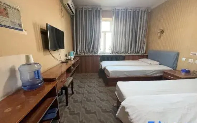 Urumqi Tuan Business Inn