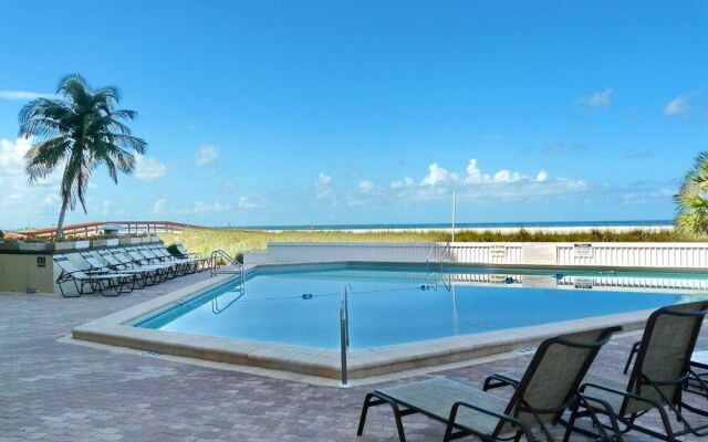 Inviting Beachfront Condo With Large Balcony and Pool