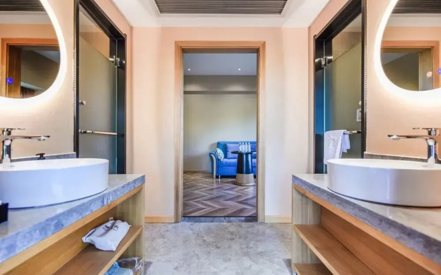 Puzhehei Xiyard Resort Hotel