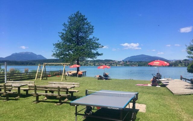 Ferienwohnungen Rausch. Exklusiver Urlaub direkt am Faaker See