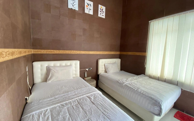 Capital O 1888 Griya RW Family Guest House
