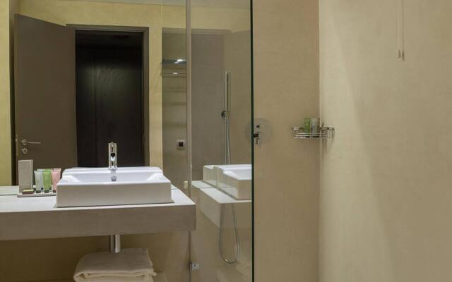 Ozadi Tavira Hotel