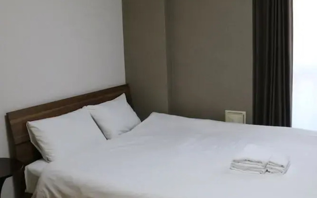 Ocean Partners Rebanga Namba Apartment