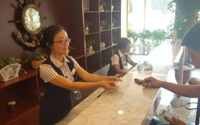 Huanle Business Hotel