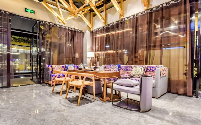 Puzhehei Xiyard Resort Hotel