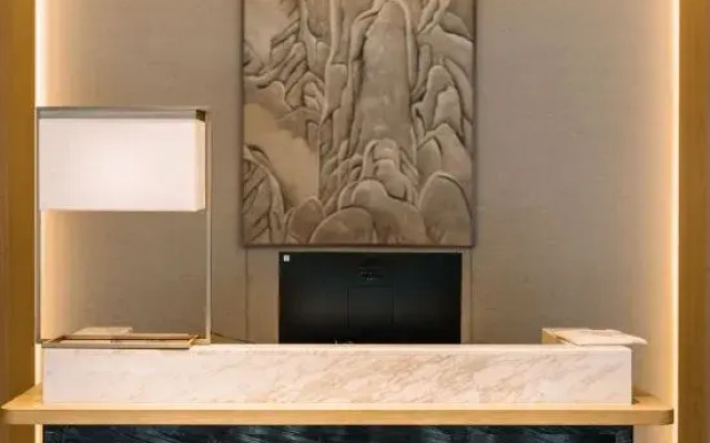 Maison New Century Hotel Lu'an
