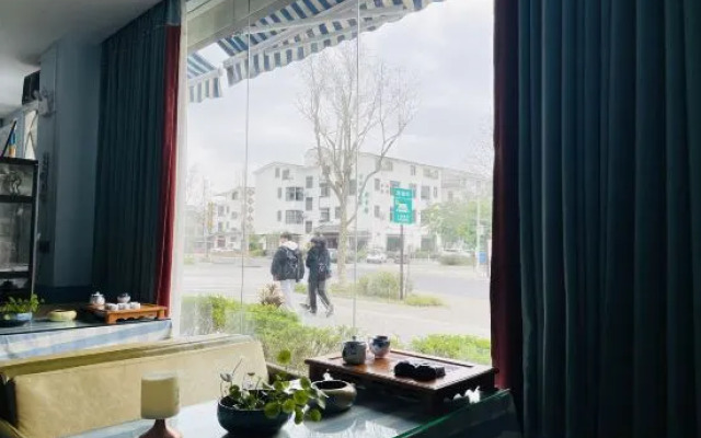Jiuzhou Chain Theme Inn (Renhua Aiqinhai Fengqing Guanjing)