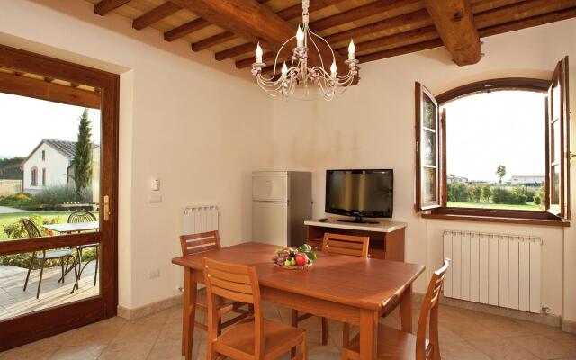 An agritourism complex with views of Assisi.