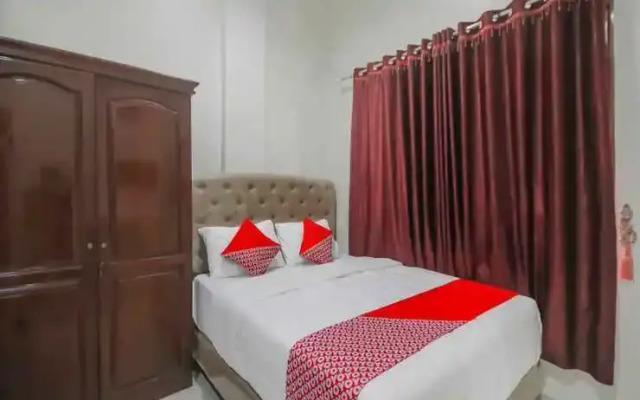 Rumah Yasmin Syariah by OYO Rooms