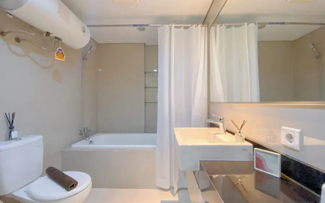 Spacious And Cozy Living Studio At Azalea Suites Apartment