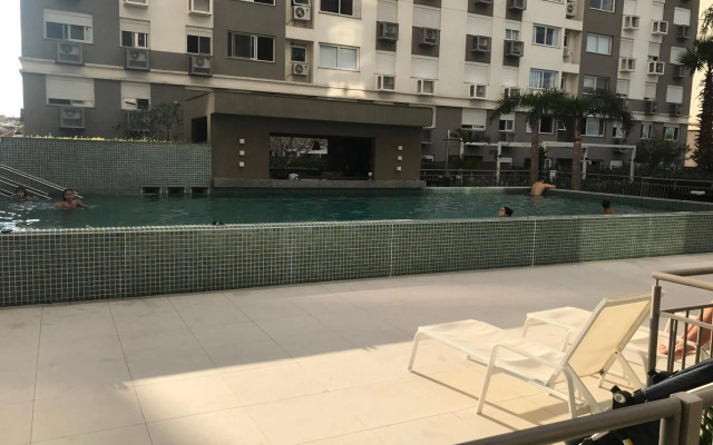 Apartamento p/ 8 com garagem churasqueira e piscina