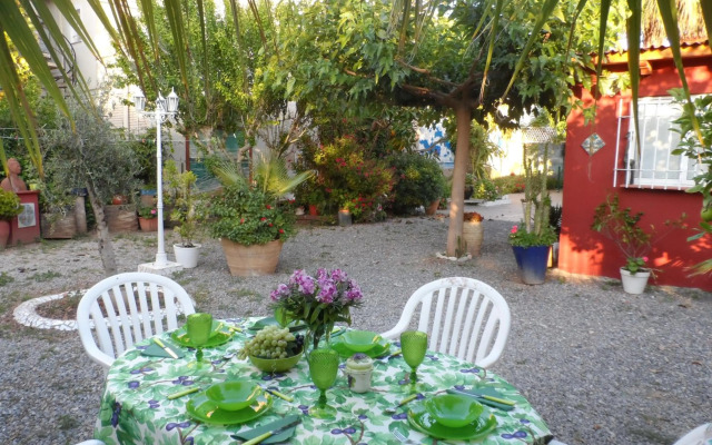 Casa con jardín frente Playa de Burriana