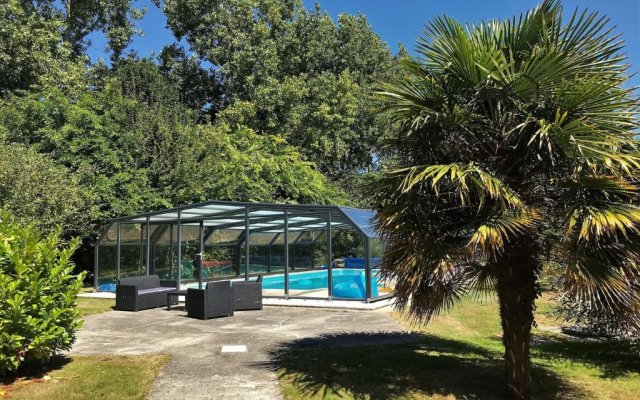 Villa de plain-pied avec WIFI, piscine privée sous abris haut à PLEUMEUR-BODOU - Ref 461