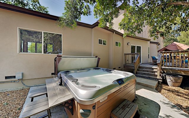 Elegant Creek-side W/ Deck & Private Hot Tub 4 Bedroom Home