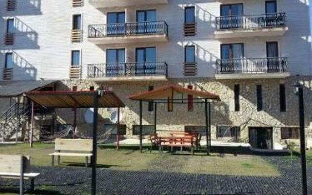 Hotel Mgzavrebi in Bakuriani apartment