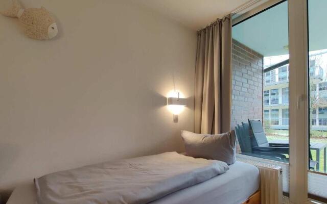 Ferienwohnung-11-mit-Terrasse-und-Strandkorb-am-Strand-Haus-Hohe-Worth-Duhnen