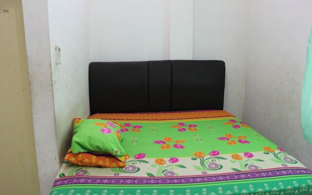 Penginapan Transit Tomato