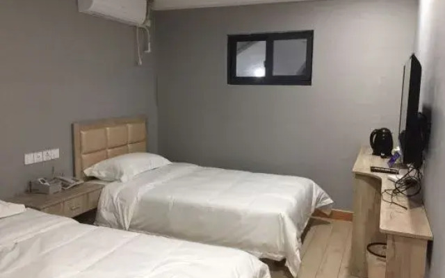 Pinghu liduo sheng business hotel